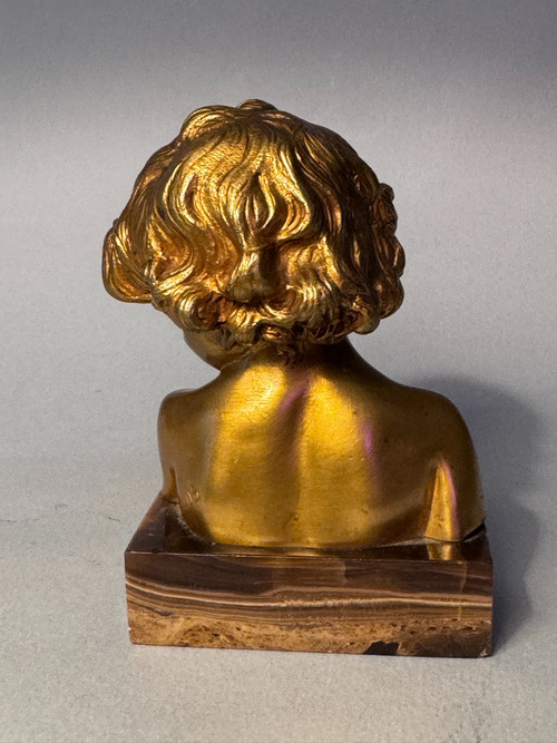 Scultura in bronzo dorato J.-M. CAMUS Busto di bambino