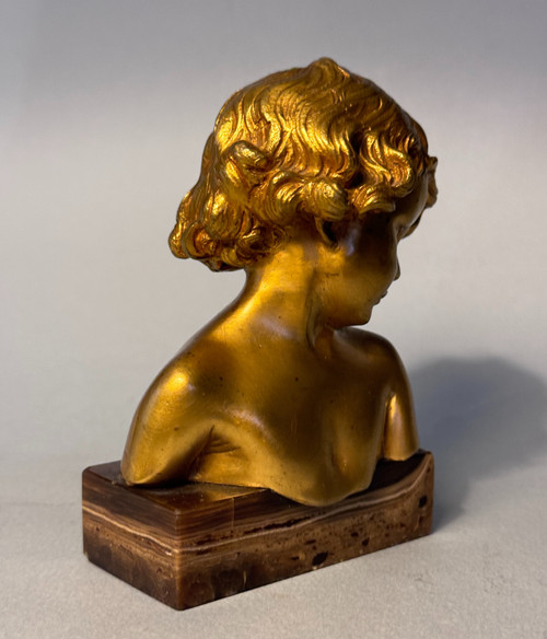 Scultura in bronzo dorato J.-M. CAMUS Busto di bambino
