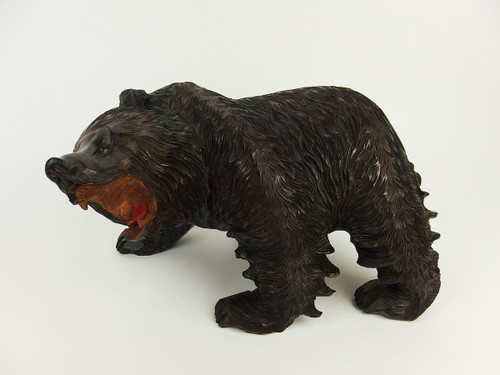 Orso Ainu in legno intagliato