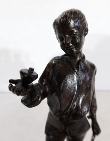  Bronzo "Ragazzo con trottola" - Fine del 19° secolo