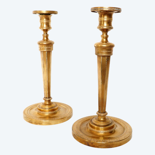 Pair of Empire period gilt bronze candlesticks / torches attributed to Claude Galle