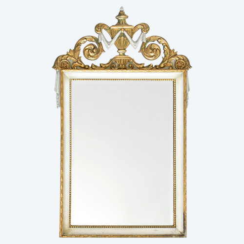 White and gold lacquered wood mirror with carved wooden pediment decorated with a basin