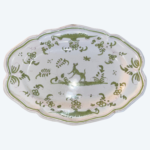 18th century Moustiers earthenware oval dish or ravier with dog motif