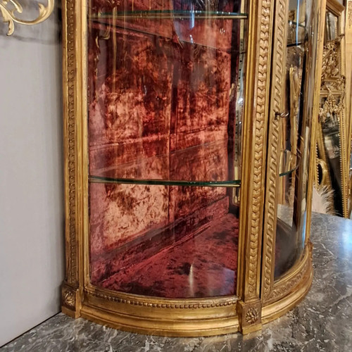 Louis XVI period display case, carved and gilded wood