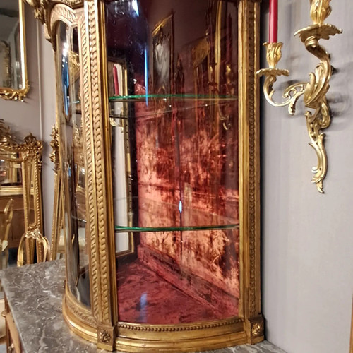 Louis XVI period display case, carved and gilded wood