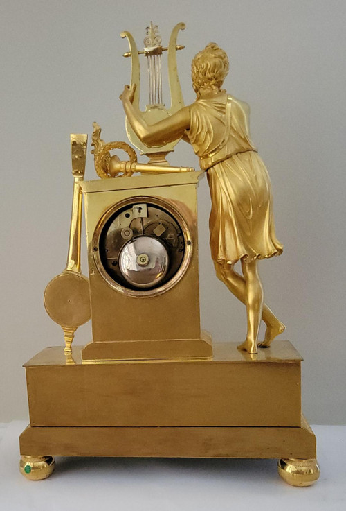 Empire "APOLLON" gilt bronze clock signed Denière et Matelin fabricants de bronzes.