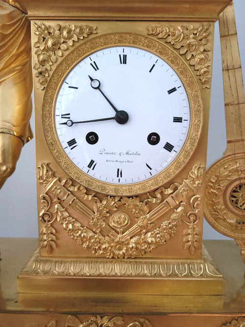 Empire "APOLLON" gilt bronze clock signed Denière et Matelin fabricants de bronzes.