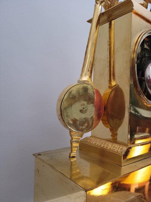 Empire "APOLLON" gilt bronze clock signed Denière et Matelin fabricants de bronzes.