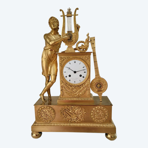 Empire "APOLLON" gilt bronze clock signed Denière et Matelin fabricants de bronzes.