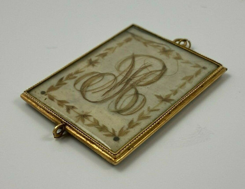 Pendentif en or XIXe travail de cheveux poinçon