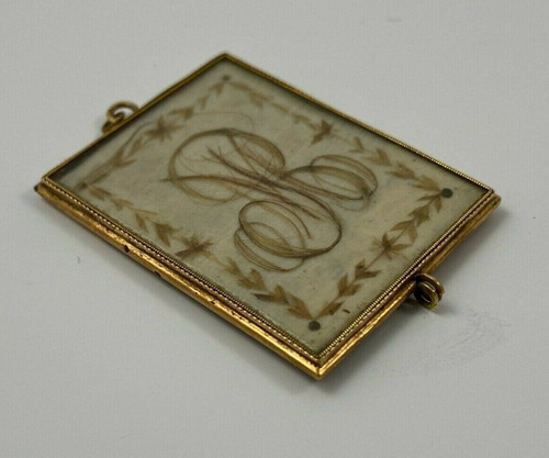Pendentif en or XIXe travail de cheveux poinçon
