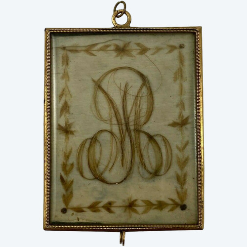 Pendentif en or XIXe travail de cheveux poinçon