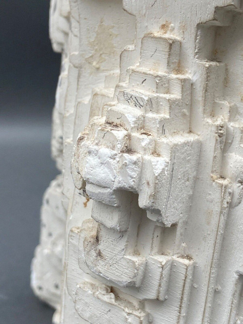 Sculpture in cellular concrete, pixelation of a man's face 1970