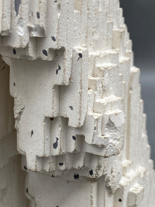 Sculpture in cellular concrete, pixelation of a man's face 1970