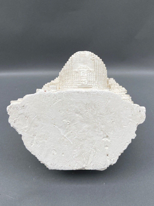 Sculpture in cellular concrete, pixelation of a man's face 1970