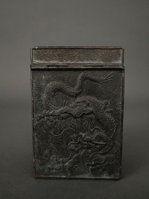 Asian tea caddy in 1900 metal with rich dragon ornamentation