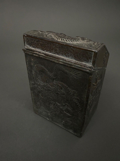 Asian tea caddy in 1900 metal with rich dragon ornamentation