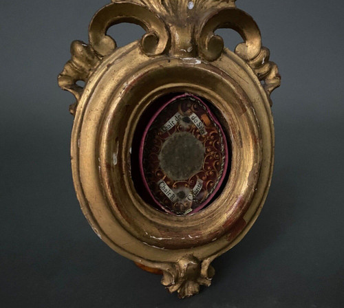 19th century Reliquary with gilded stucco frame