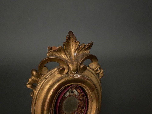 19th century Reliquary with gilded stucco frame