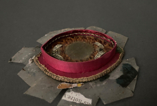 19th century Reliquary with gilded stucco frame