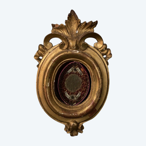 19th century Reliquary with gilded stucco frame