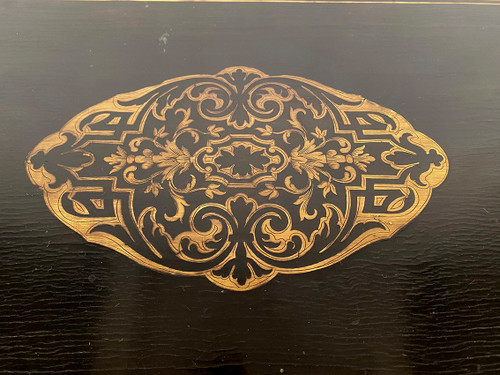 Console Napoléon III formant table à jeux, bois noirci et marqueterie de laiton