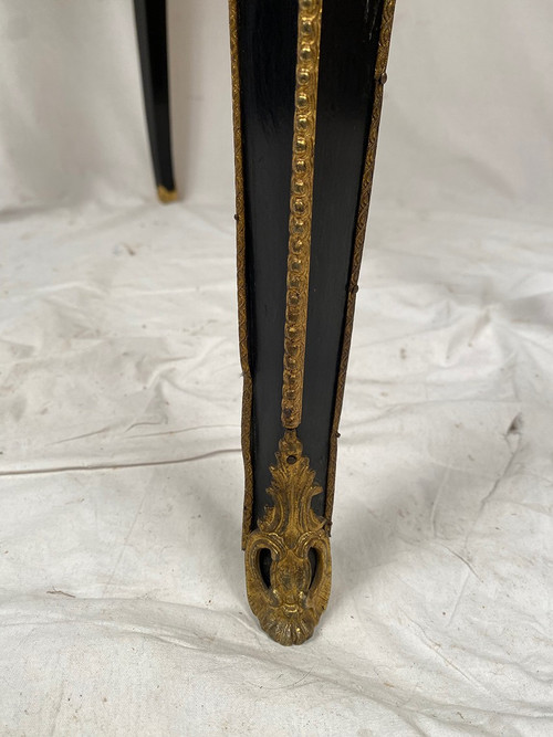 Console Napoléon III formant table à jeux, bois noirci et marqueterie de laiton
