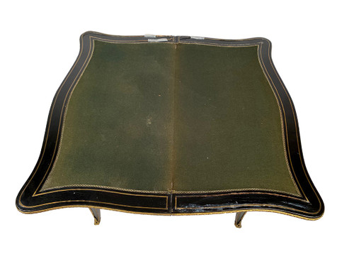 Console Napoléon III formant table à jeux, bois noirci et marqueterie de laiton