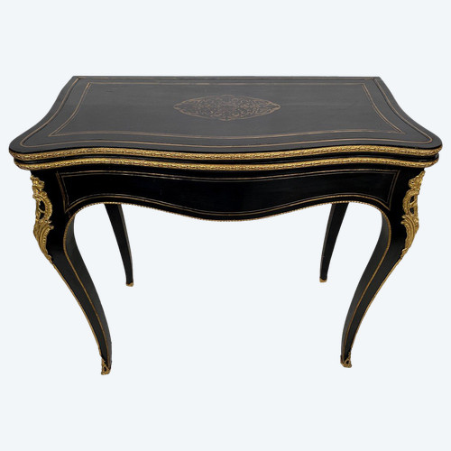 Console Napoléon III formant table à jeux, bois noirci et marqueterie de laiton