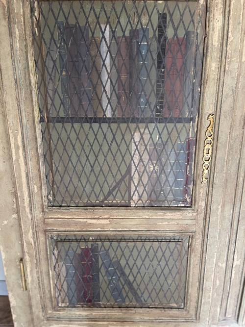 Bibliothèque en bois patine datant de la fin du 19 e siècle avec trompe l’oeil