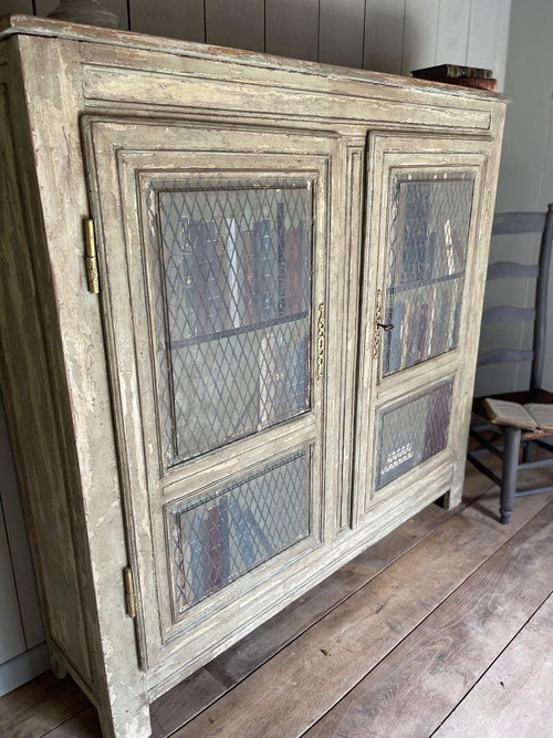 Bibliothèque en bois patine datant de la fin du 19 e siècle avec trompe l’oeil