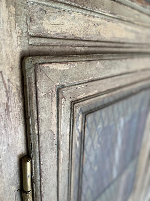Bibliothèque en bois patine datant de la fin du 19 e siècle avec trompe l’oeil
