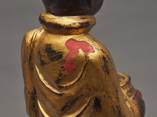 Soggetto di Buddha in legno intagliato e dorato in policromia, fine XIX secolo