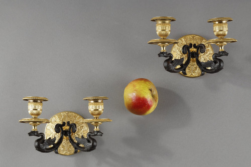 Small pair of two-light ormolu sconces with brown patina