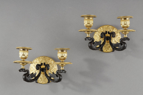 Small pair of two-light ormolu sconces with brown patina