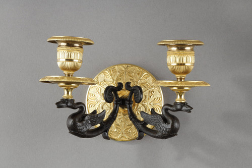 Small pair of two-light ormolu sconces with brown patina