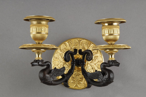 Small pair of two-light ormolu sconces with brown patina