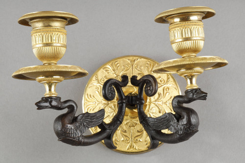 Small pair of two-light ormolu sconces with brown patina