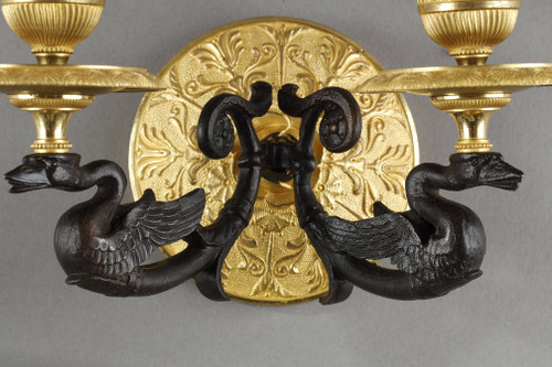 Small pair of two-light ormolu sconces with brown patina