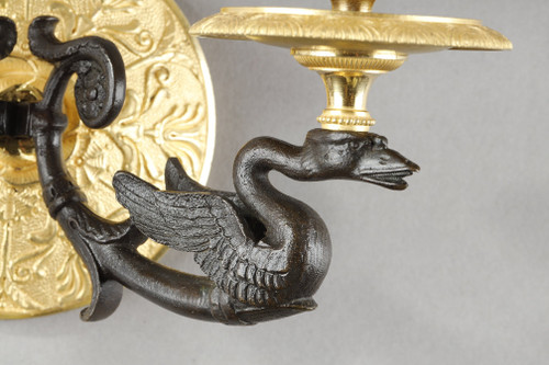 Small pair of two-light ormolu sconces with brown patina
