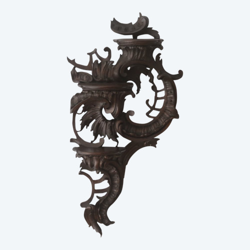  Carved oak wall lamp in the Louis XV rocaille style.