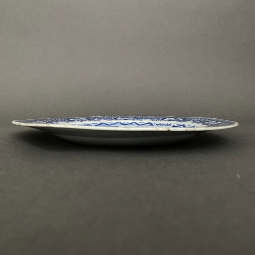 Assiette bleue de Chine XIXe décor de papillons