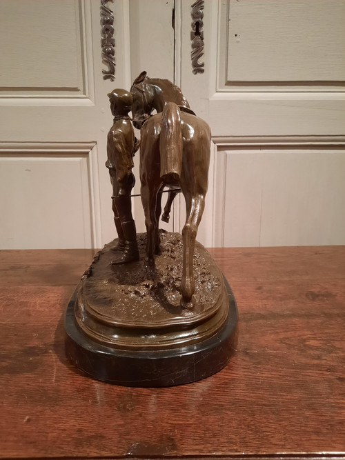 Bronze representing a jockey and his horse signed P.J. Mène 1866, 20th century.