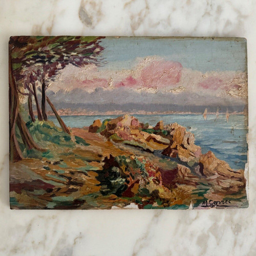 Huile sur carton représentant une côte rocheuse par M. Garrec XXe