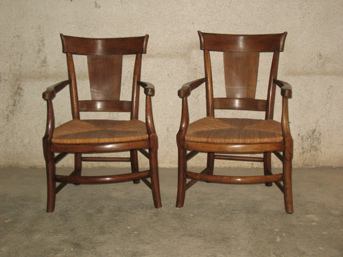 Pair of Restoration-period straw-covered armchairs in walnut Origin Périgord 19th century Directoire style