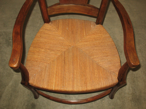 Pair of Restoration-period straw-covered armchairs in walnut Origin Périgord 19th century Directoire style