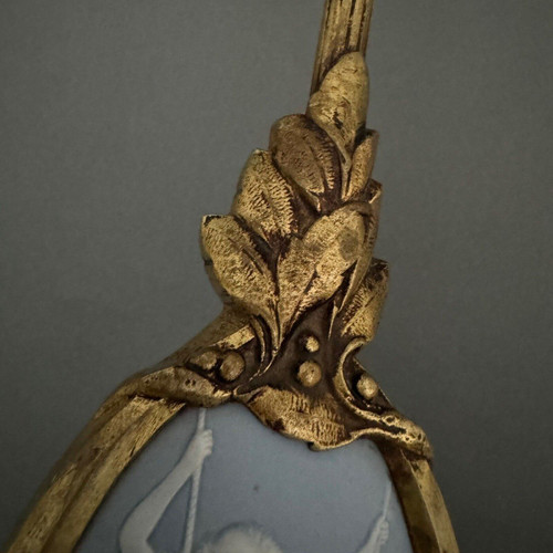 Gilded bronze wall lamp with Wedgwood plaque couple on swing 20th century