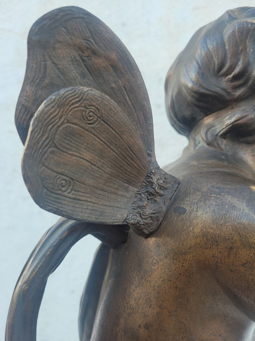 Bronzo di putto alato in piedi, fine XIX secolo inizio XX secolo