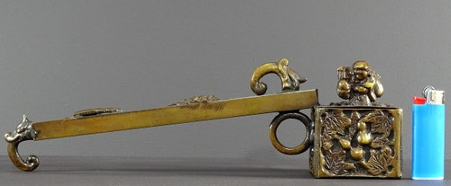 Japan, 1930s/1950s, Bronze inkwell with relief decoration of a figure and a dragon.