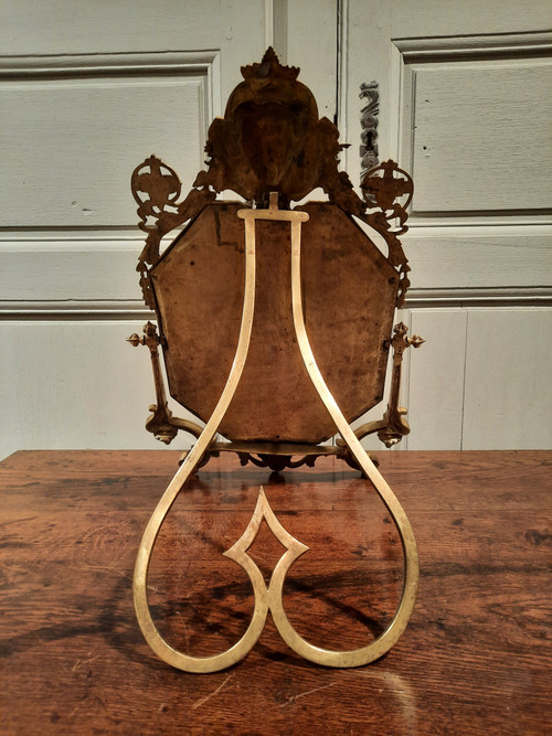 Miroir de salon en bronze de style Régence d’époque XIXème siècle.